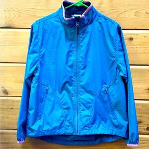 MOVING COMFORT Cycling jacket with zip pockets and carry bag in pocket on back